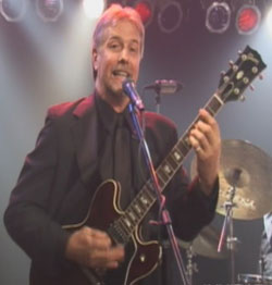Jerry singing and playing