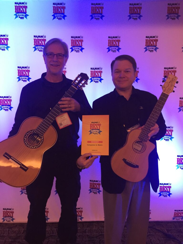 Jerry and Jason accepting an award