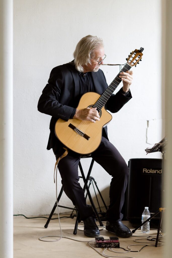 Jerry playing guitar at wedding